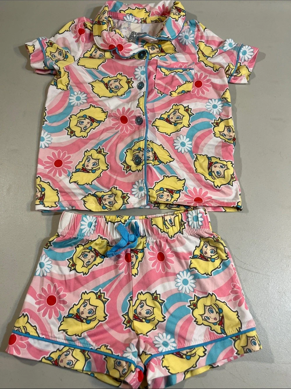 Girls Pink Printed Short Pajama Set with Yellow Character Accents